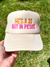 Load image into Gallery viewer, He’s A 10 But In Pesos Trucker Hat
